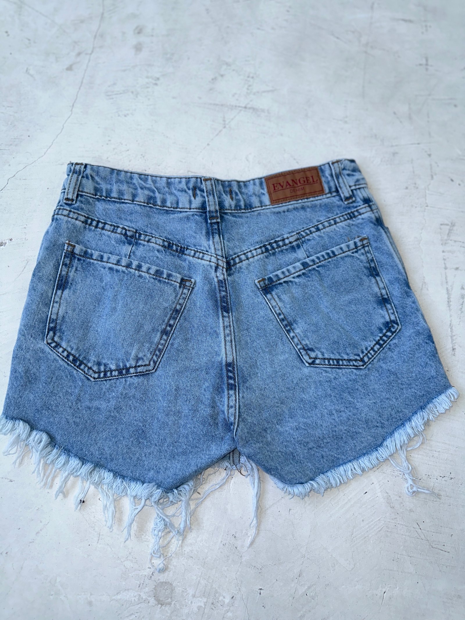 SHORT POLLERA CELESTE RÍGIDO