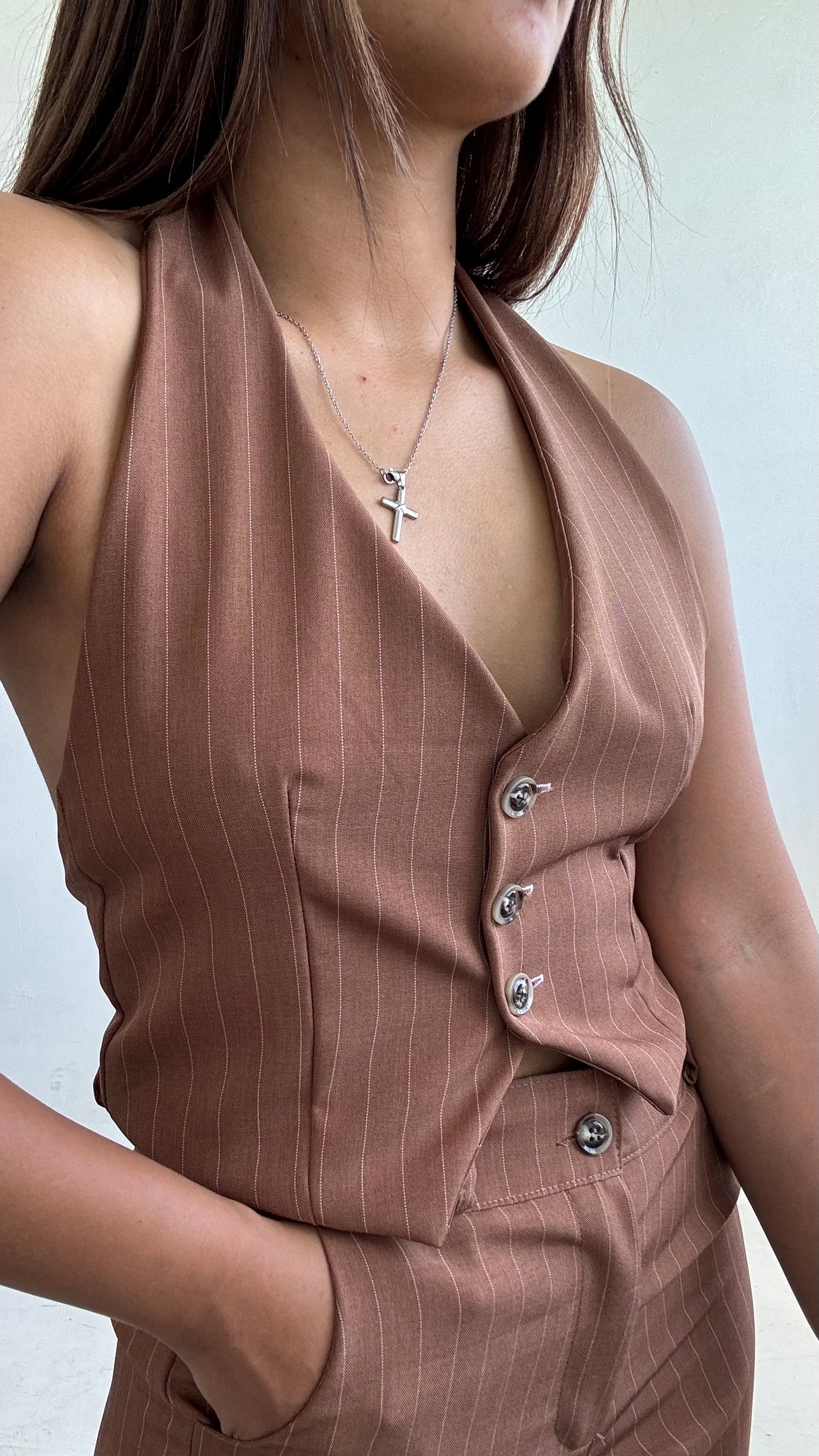 CHALECO CON HEBILLA A RAYAS