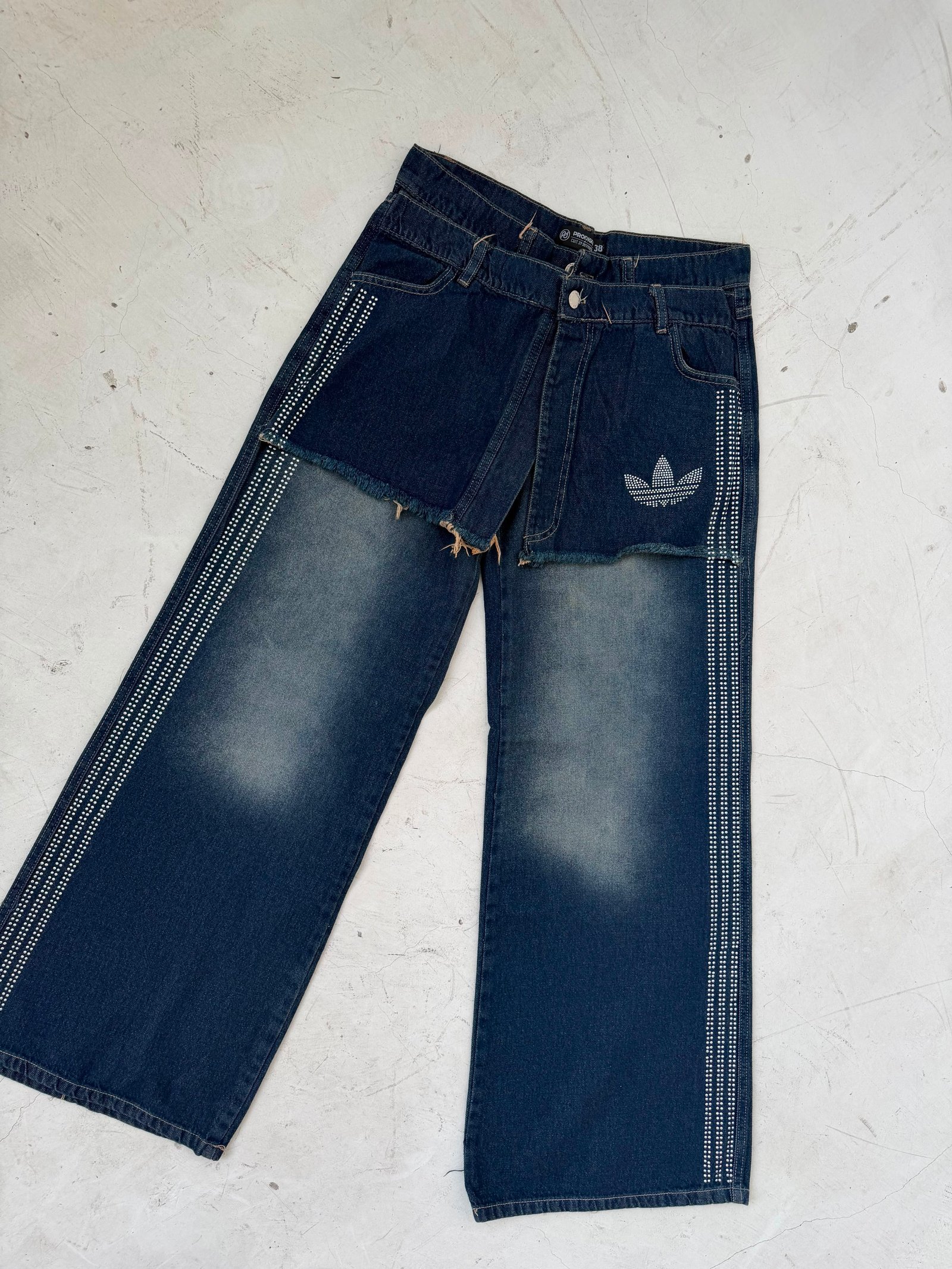 61d49660-bd9f-41e3-8330-cdf46131ba21 WIDE LEG STRASS LÍNEAS JEAN OXIDO