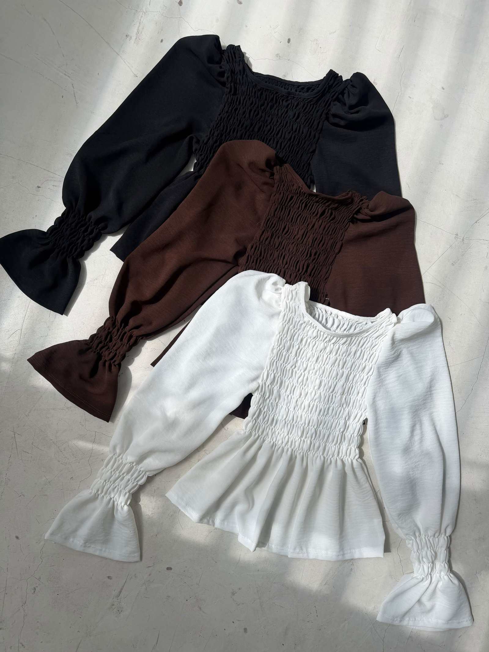 BLUSA FRUNCE MANGA LARGA